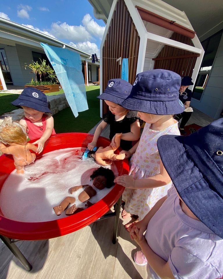 Happy children engaging in everyday play - The Nest Early Education Southport
